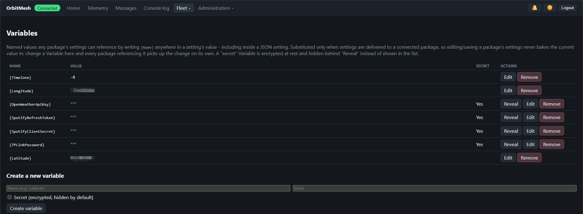 Variables page - a name/value list, secrets hidden behind Reveal